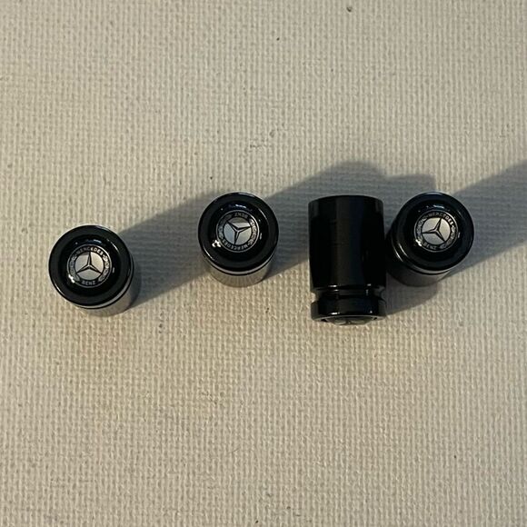 Mercedes Benz Logo valve Stem caps in black set of 4 NWT - Picture 1 of 4
